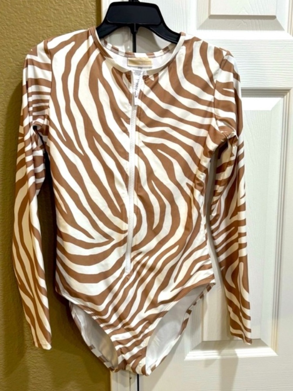 MICHAEL Michael Kors Striped Long Sleeve Bodysuit in Cream and Brown